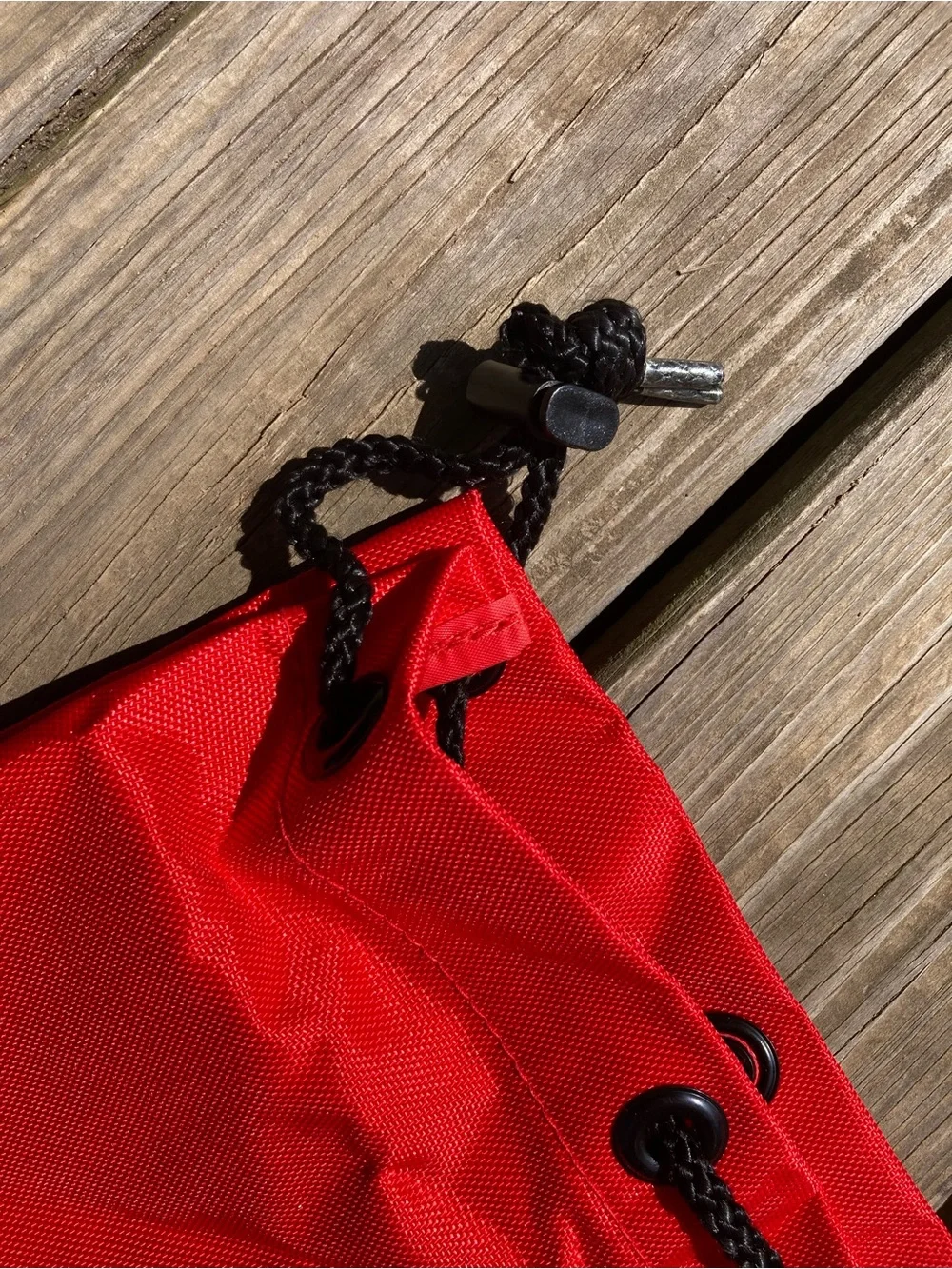 Marlboro Red Duffel with Black Web Handles and Adventure Team Logo
